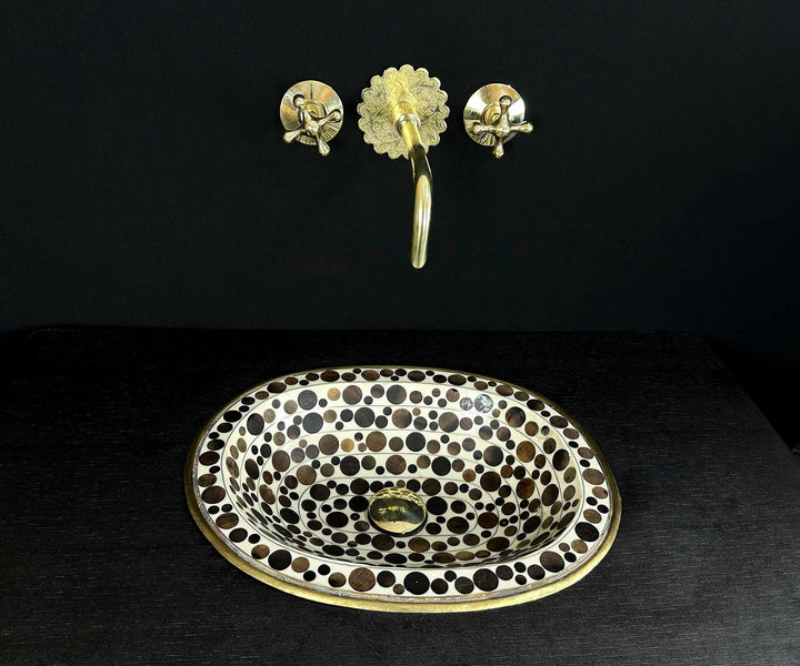 Oval Brass Sink with Circular Wood and White Resin Accents