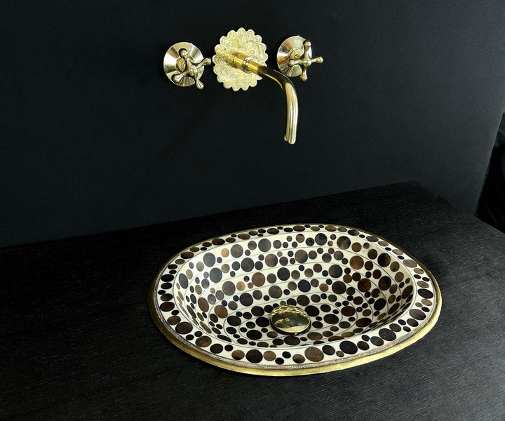 Oval Brass Sink with Circular Wood and White Resin Accents