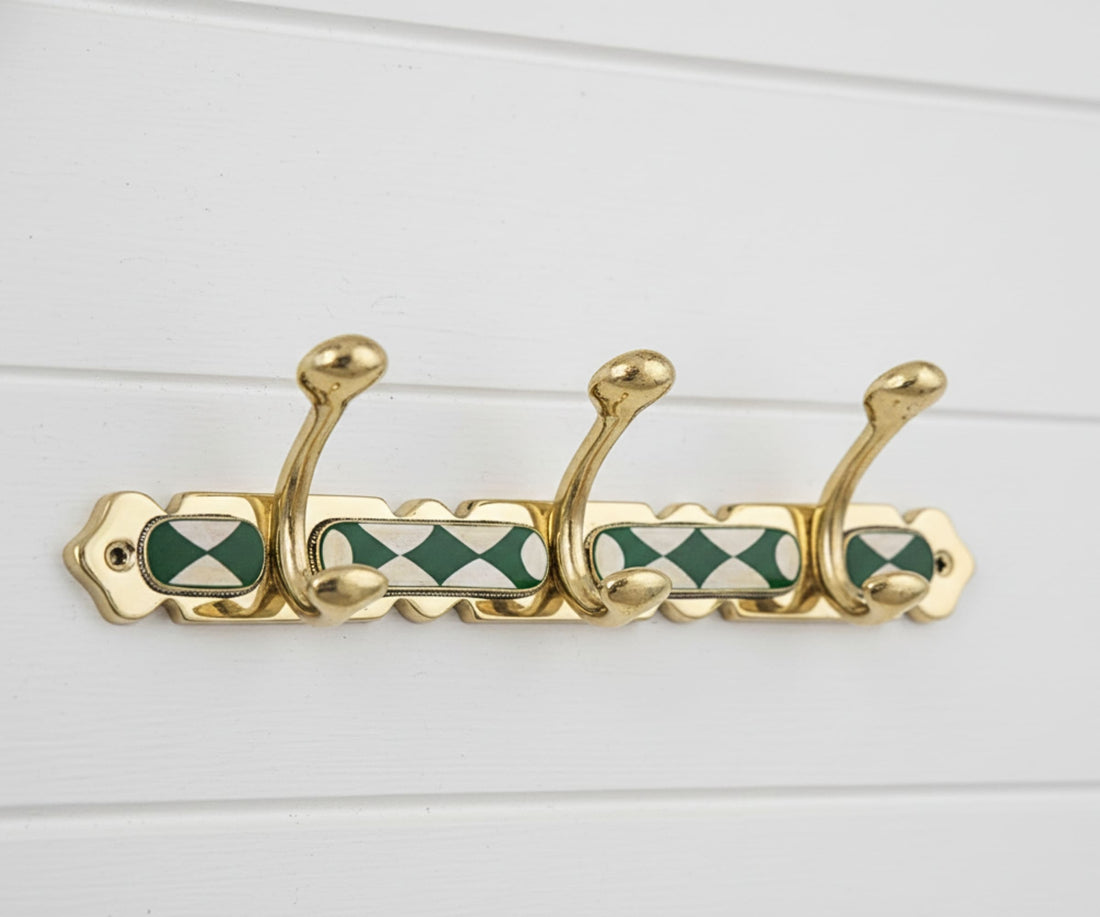 Handmade brass wall hooks with white and green resin inlay by LuxeBrass
