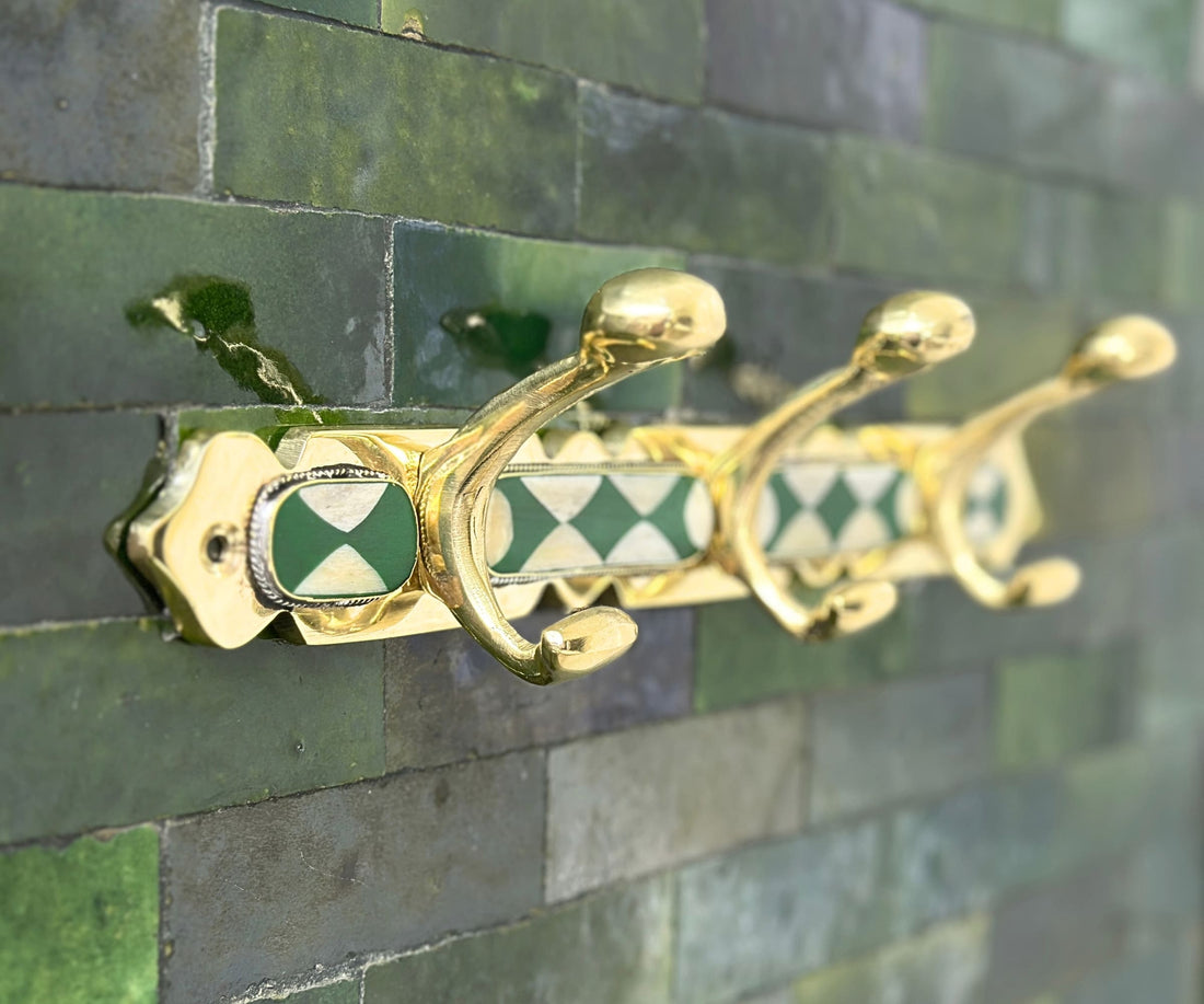 Handmade brass wall hooks with white and green resin inlay by LuxeBrass
