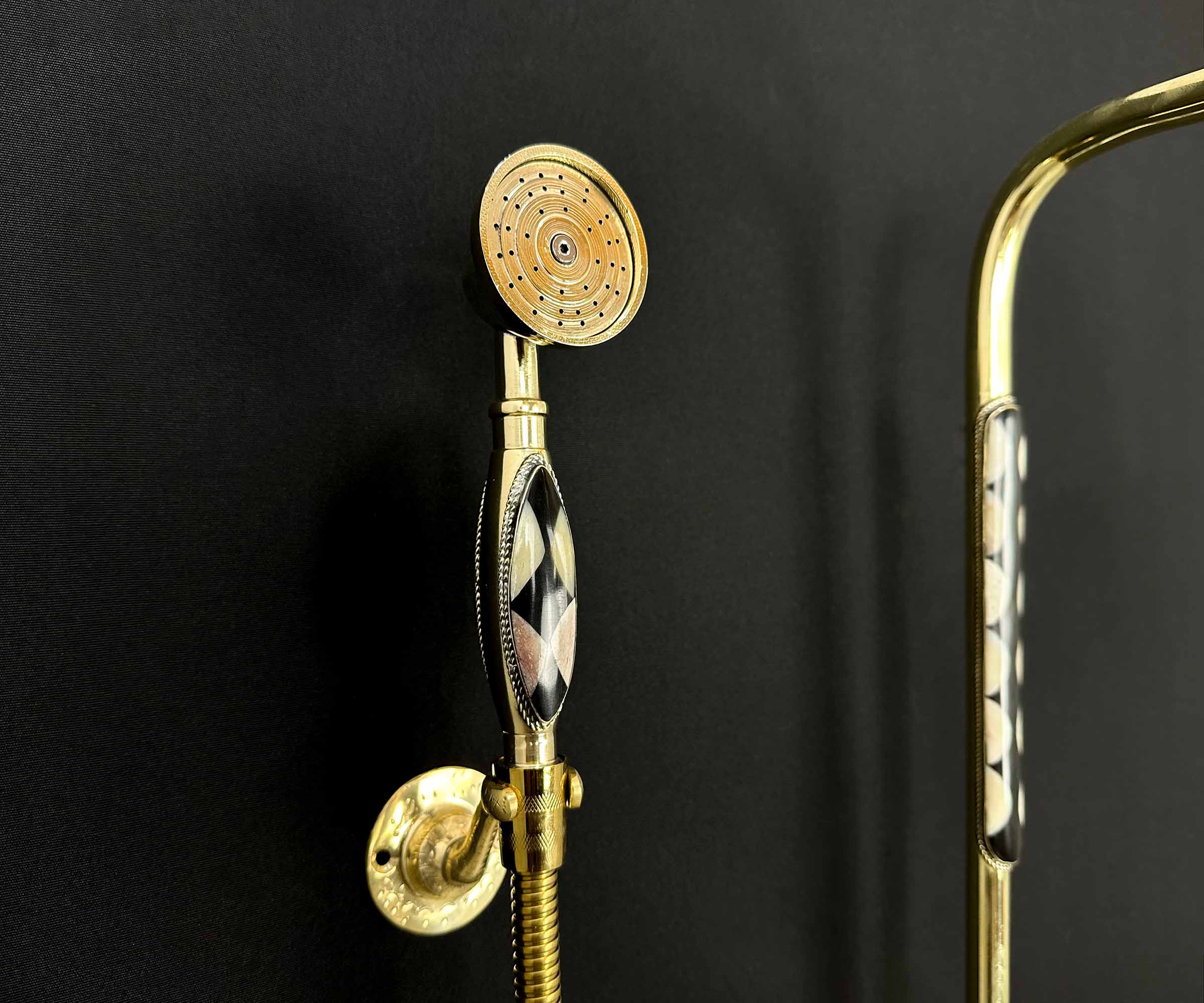 Close up of Bone, Black & White Resin Inlay on Brass Shower System Elegant Bathroom Design