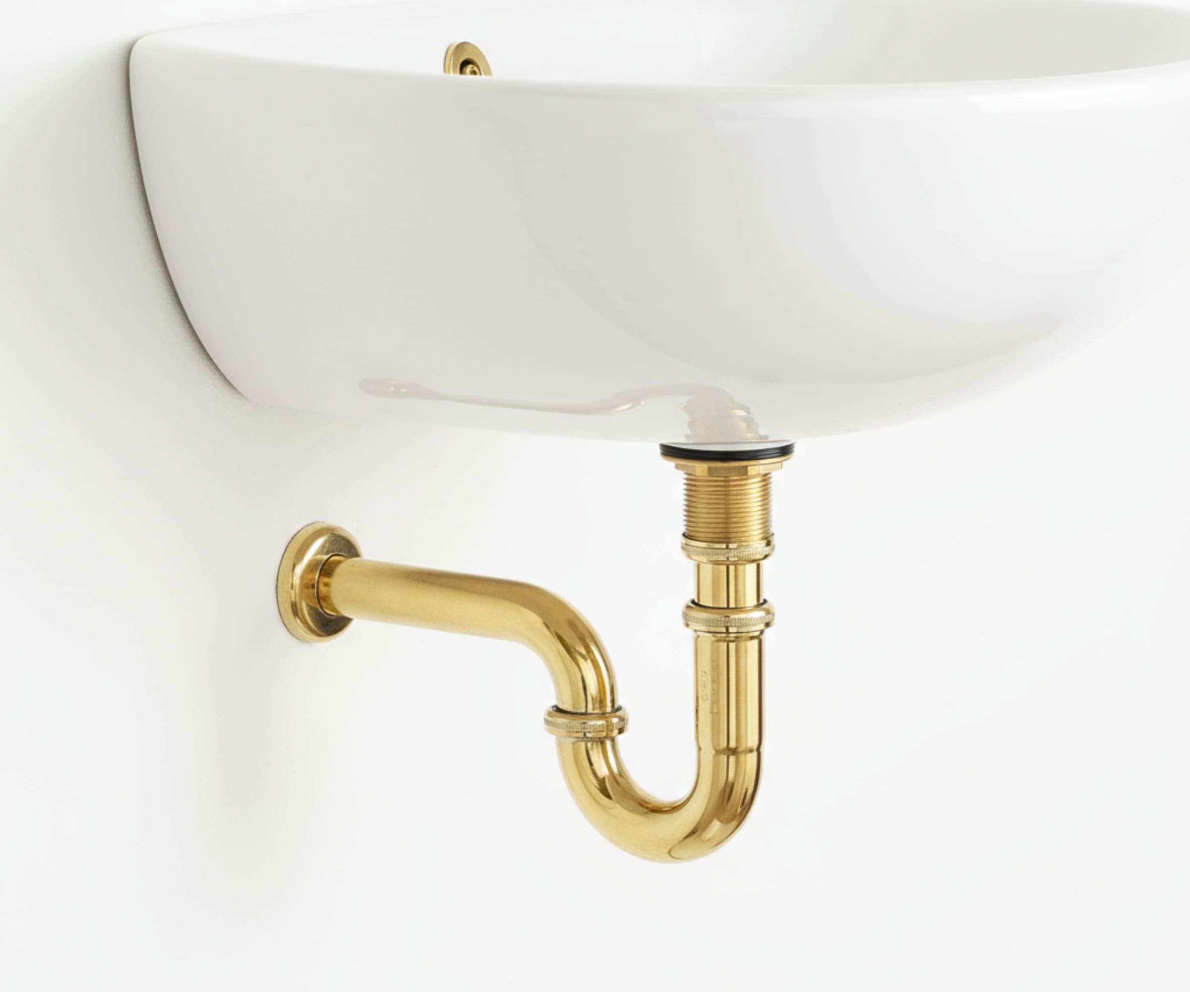 unlacquered brass p trap kit under bathroom sink